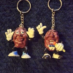 Novelty Raisin Character Keychain Pair Of Two 1987